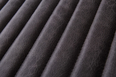30" Charcoal And Brown Faux Leather Tufted Distressed Arm Chair