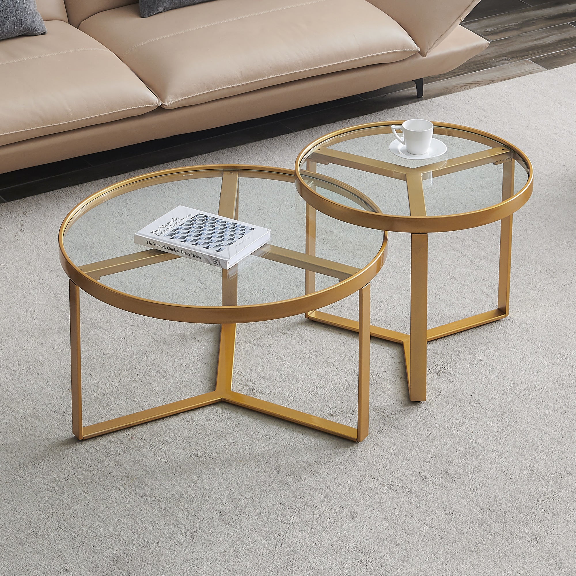 Modern Nesting coffee table; Golden metal frame with round tempered glass tabletop